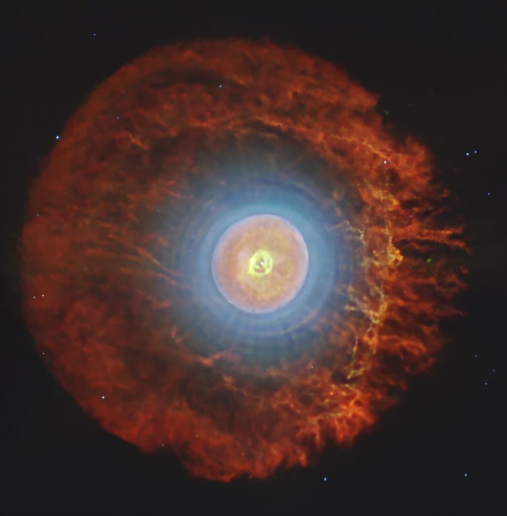 NASA obrázek dne: Planetární mlhovina s kosmickými fullereny